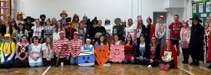 staff from whipton barton federation join in the fun at world book day
